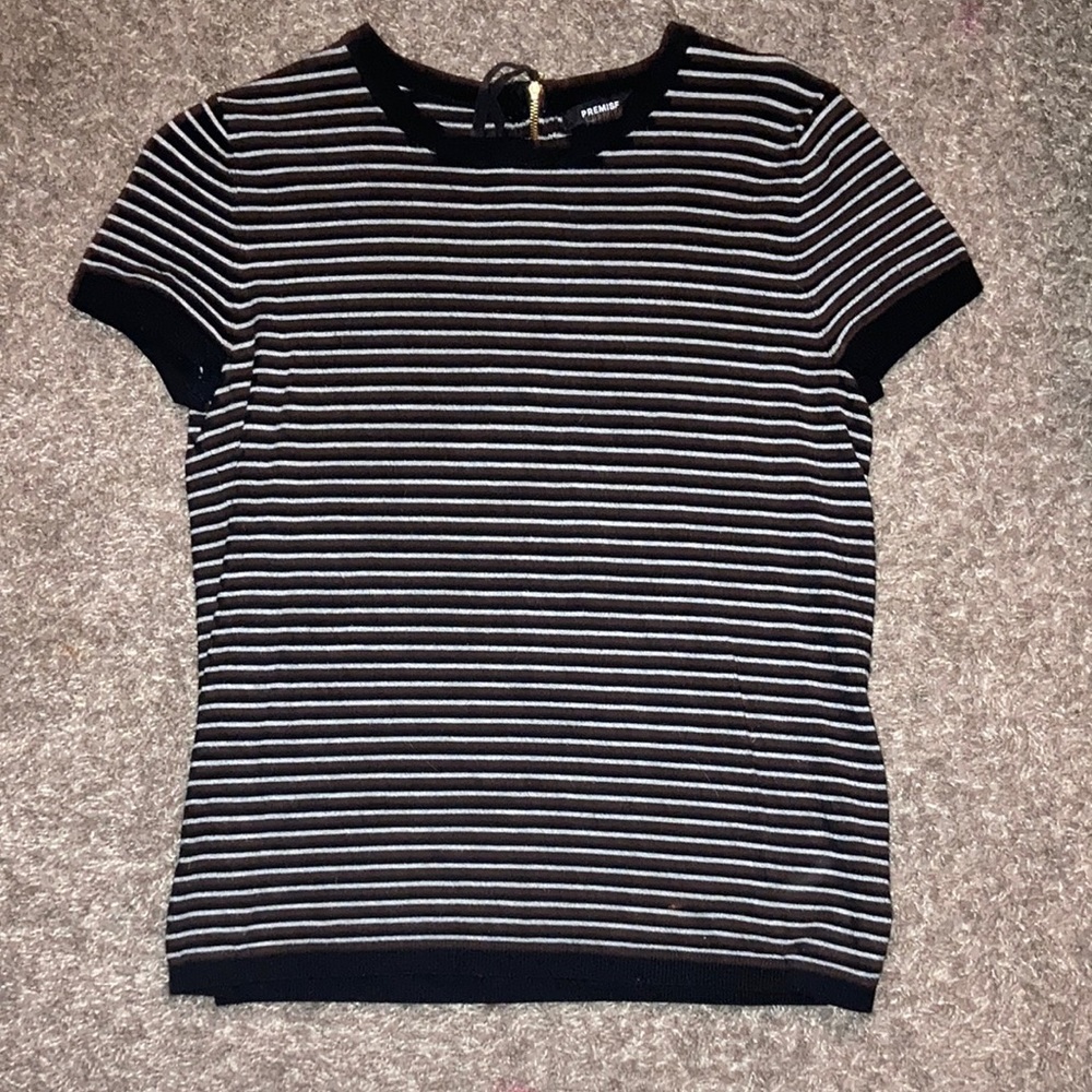 The size is a small. The brand is PREMISE. Color is black and white stripes.